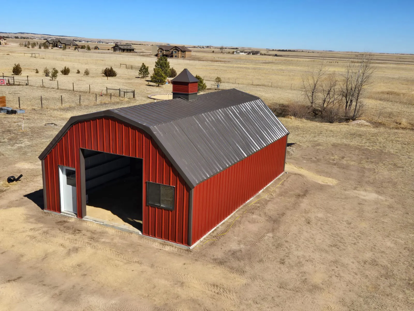 Steel barn with a gambrel roof in Peyton, Colorado