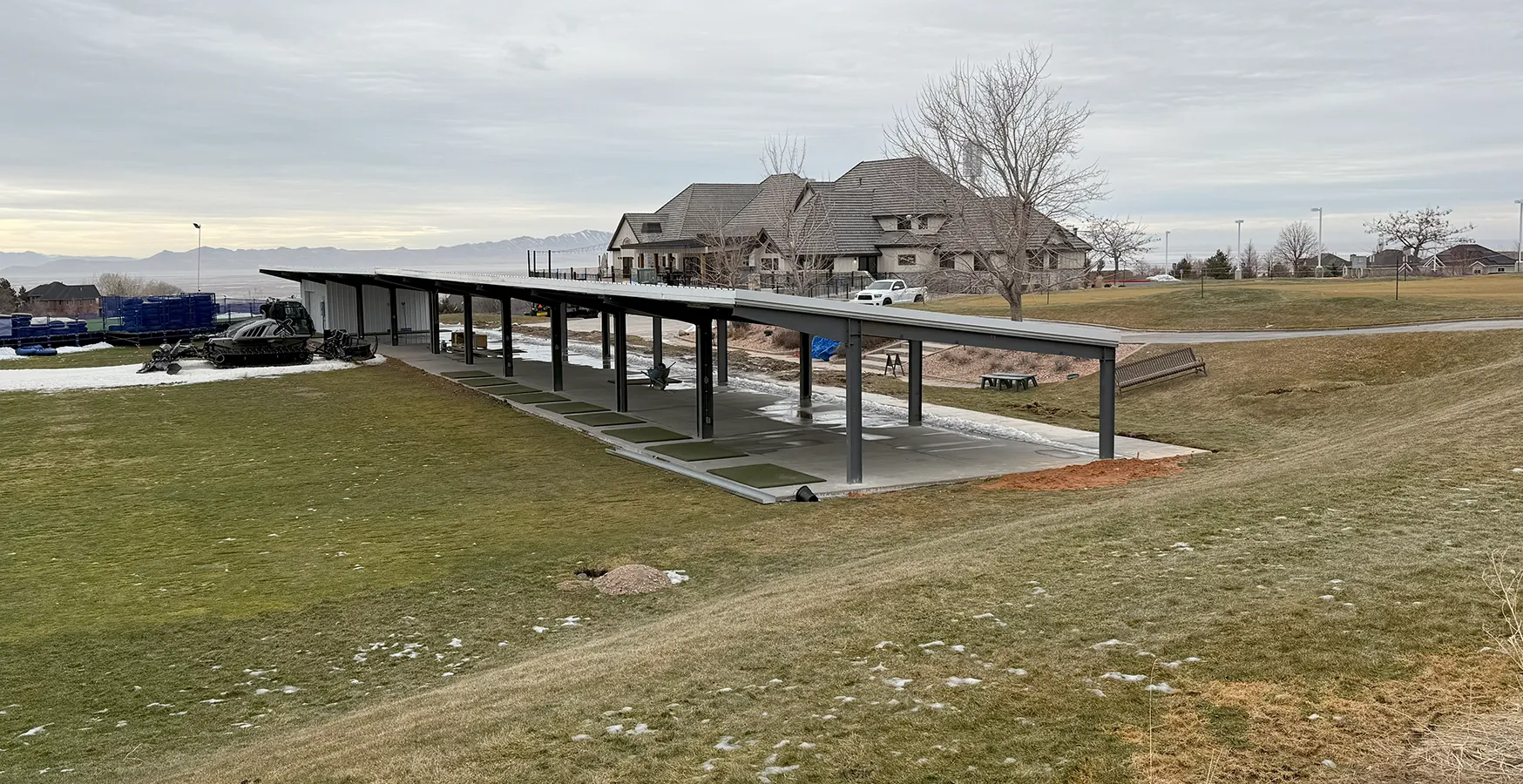 Single-slope roof-only steel structure for a driving range in North Salt Lake, Utah
